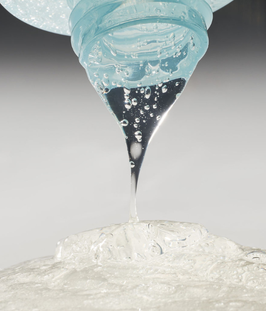 Cleanser dripping out of bottle