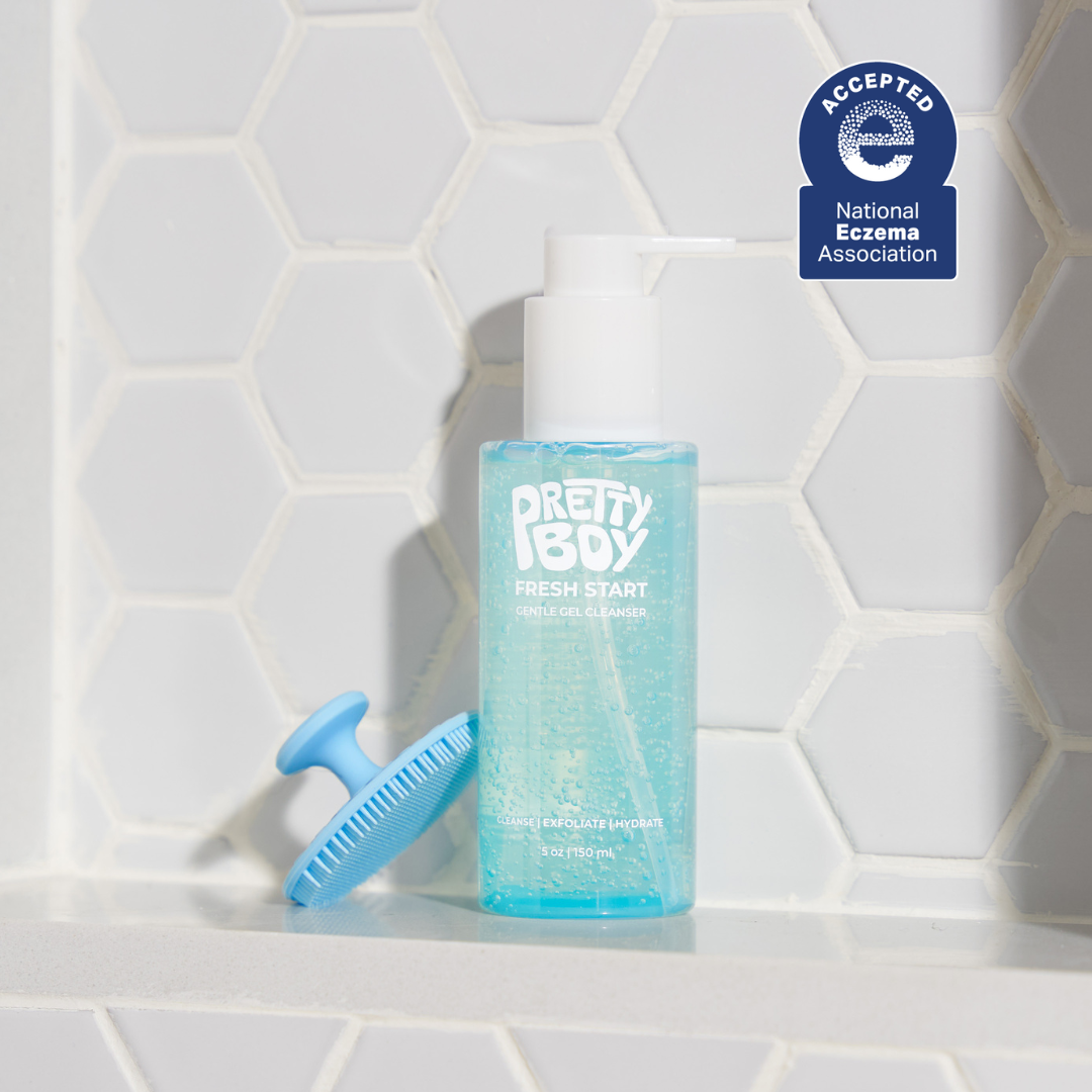 Gel cleanser and exfoliating brush on a bathroom counter - National Eczema Association accepted